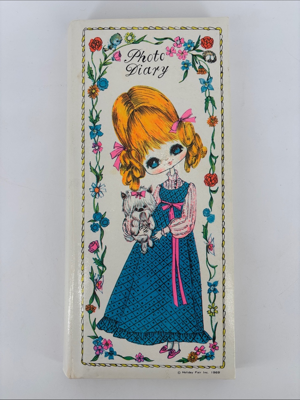 Vintage 1969 kitschy big eyed girl photo album by holiday fair